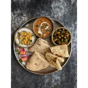 Dal Makhani, Bhindi Ki Sabzi, Boondi Raita, Salad, Papad, Chapati